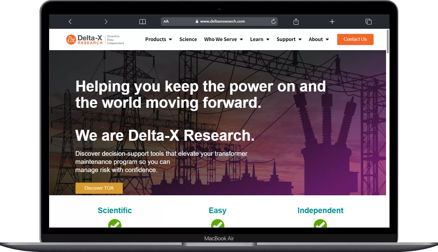 Delta-x Research website on laptop